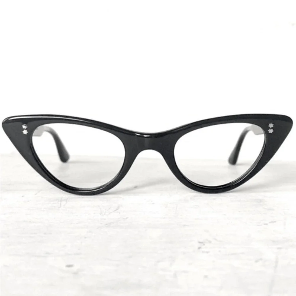 Vintage cat frame glasses by France Swank. Mint condition.